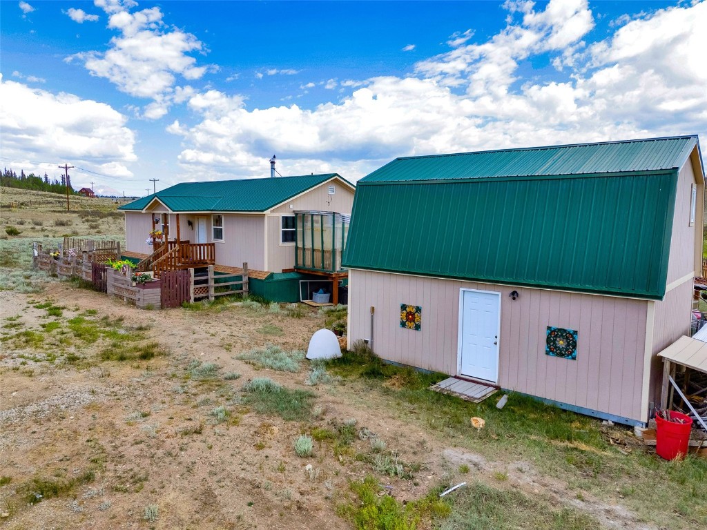 59 Chief Trail Como, CO 80456 - Photo 1 of 44 a backyard of a house with lots of green space