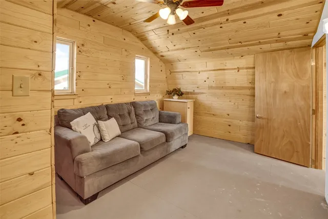 a view of a livingroom with furniture