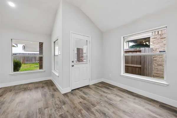 a view of an empty room and window