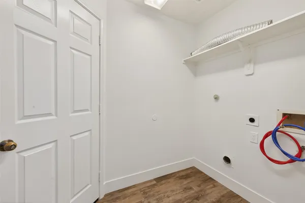 a view of a room with rack on the wall