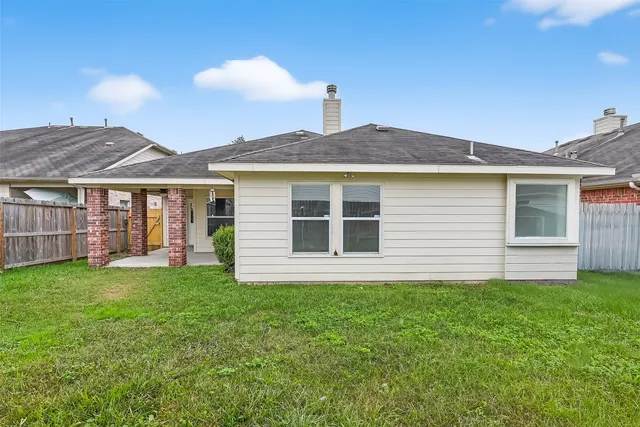 a house view with a garden space