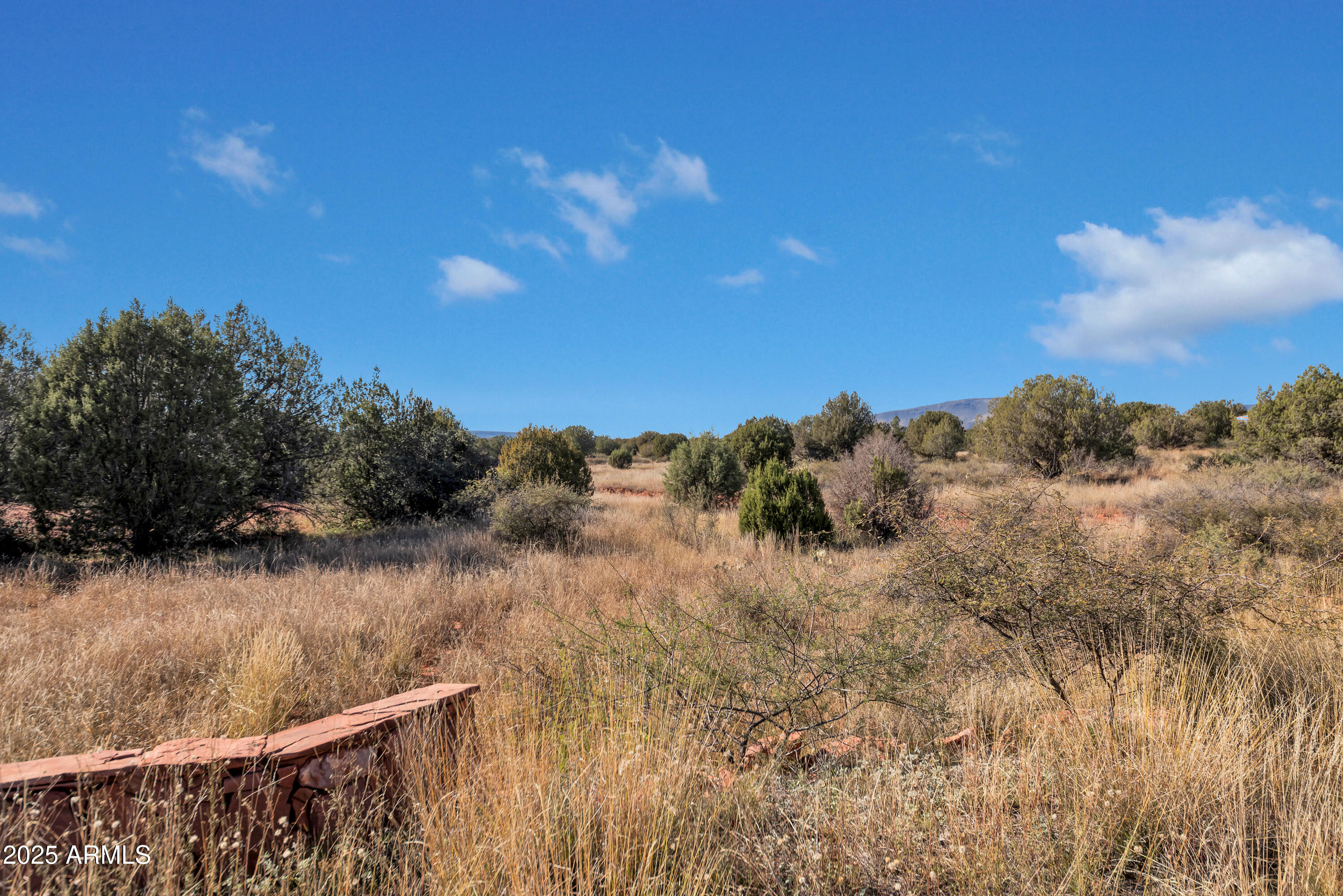 75 Estrella Road, Unit 3 Sedona, AZ 86336 - Photo 13 of 28 a view of a lake in middle of forest