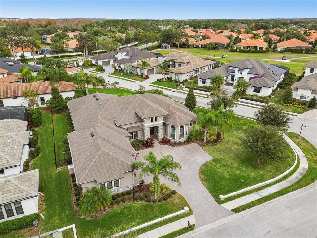 10605 Sabella Drive Trinity, FL 34655 - Photo 2 of 77 an aerial view of a house with a garden