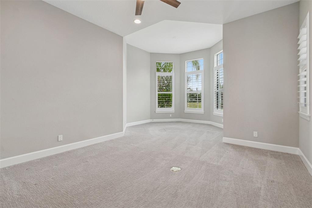 10605 Sabella Drive Trinity, FL 34655 - Photo 21 of 77 an empty room with windows and closet