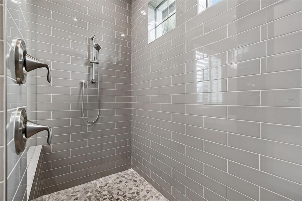 10605 Sabella Drive Trinity, FL 34655 - Photo 31 of 77 a bathroom with a shower