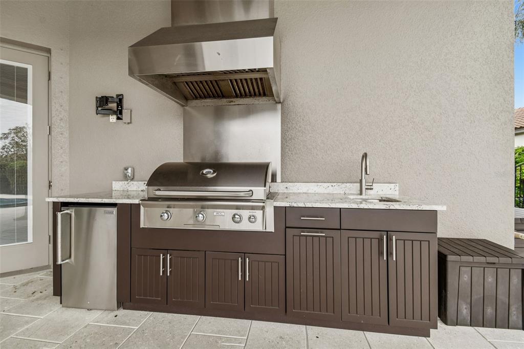 10605 Sabella Drive Trinity, FL 34655 - Photo 47 of 77 a kitchen with a sink and cabinets