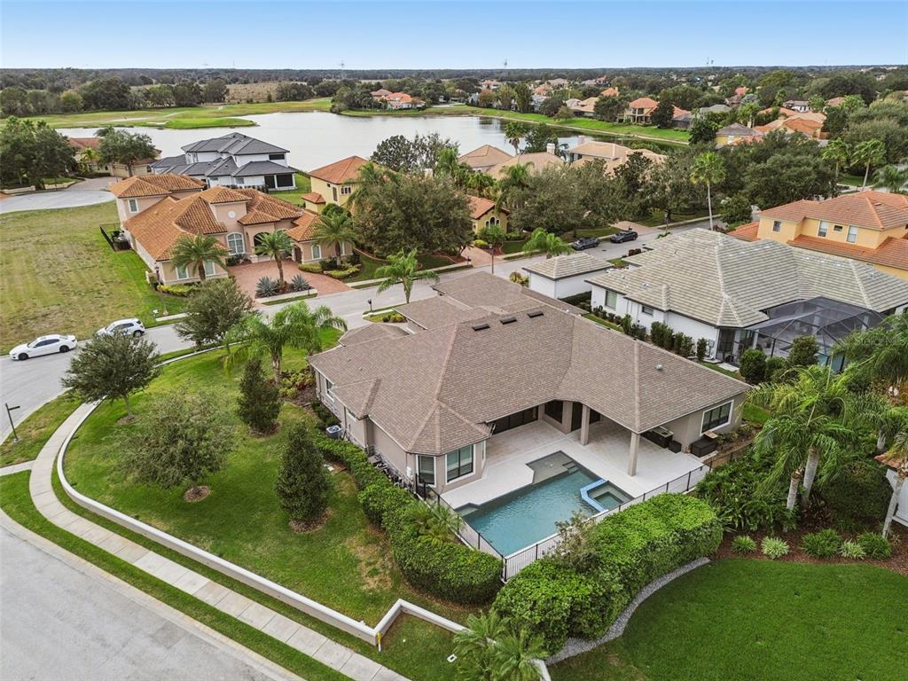 10605 Sabella Drive Trinity, FL 34655 - Photo 66 of 77 an aerial view of residential houses with outdoor space and river