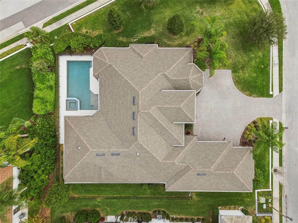 10605 Sabella Drive Trinity, FL 34655 - Photo 67 of 77 an aerial view of a house with garden space and street view