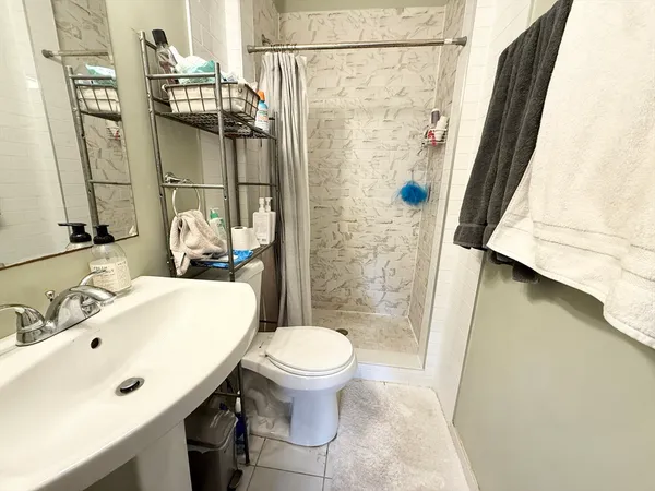 a bathroom with a sink and toilet