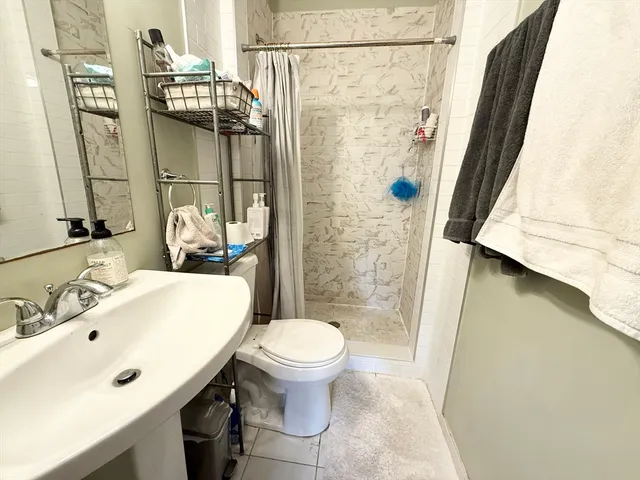 a bathroom with a sink and toilet