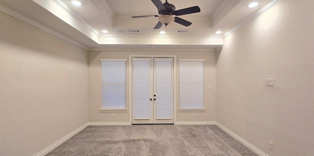 127 Bridgewater Onalaska, TX 77360 - Photo 14 of 34 an empty room with chandelier fan