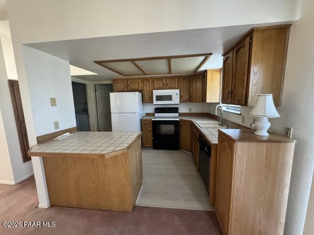 250 Anderson Road Prescott, AZ 86303 - Photo 5 of 17 a large kitchen with stainless steel appliances granite countertop a stove a sink a refrigerator and a microwave