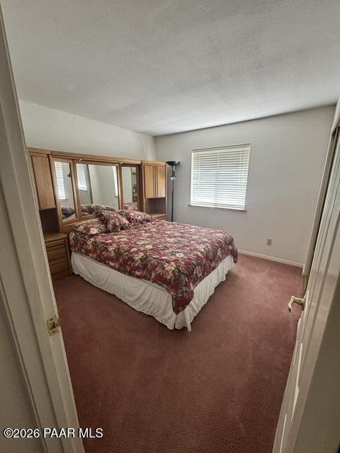 250 Anderson Road Prescott, AZ 86303 - Photo 7 of 17 a bedroom with a bed and window