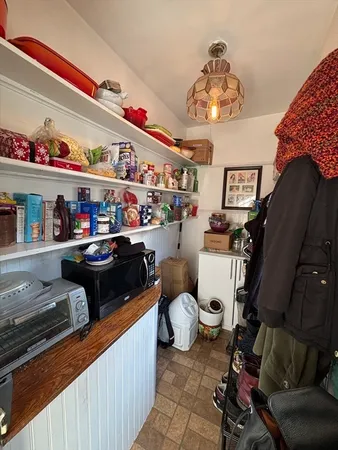 a room with lots of furniture and clutter