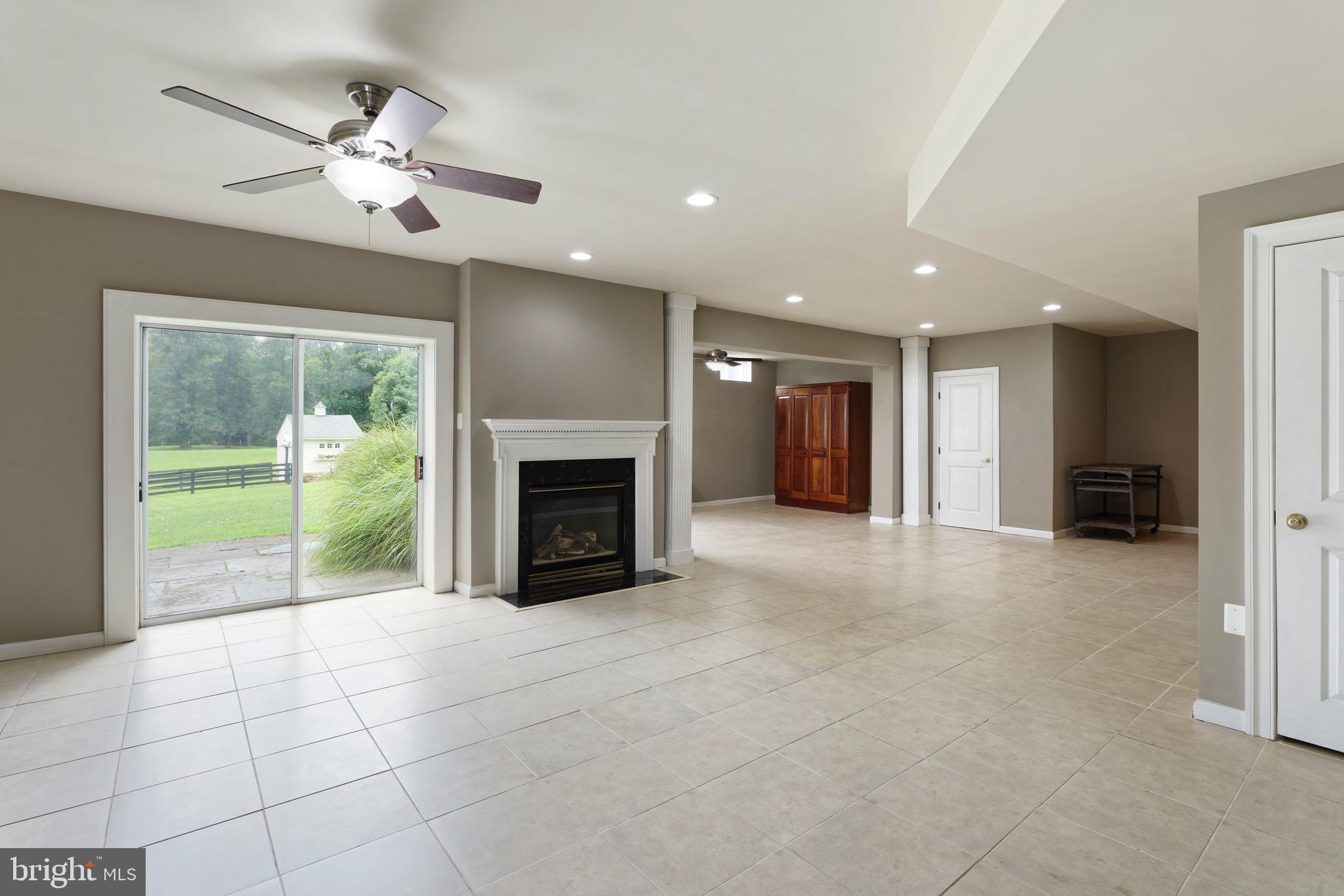 22865 Foxcroft Road Middleburg, VA 20117 - Photo 26 of 112 Walk out LL has fireplace and outside stone patio
