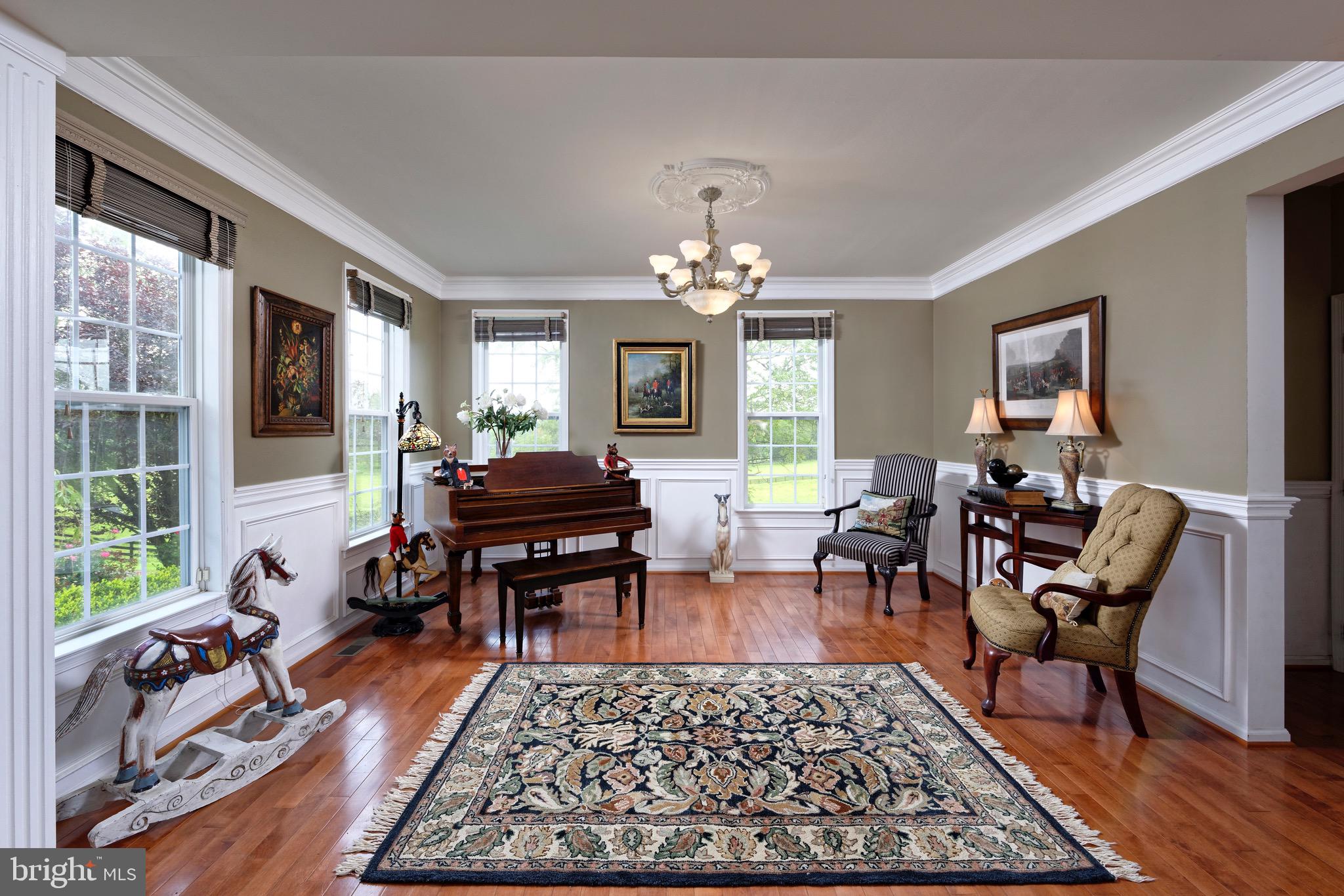 22865 Foxcroft Road Middleburg, VA 20117 - Photo 7 of 112 Living Room has wainscoting & crown moldings