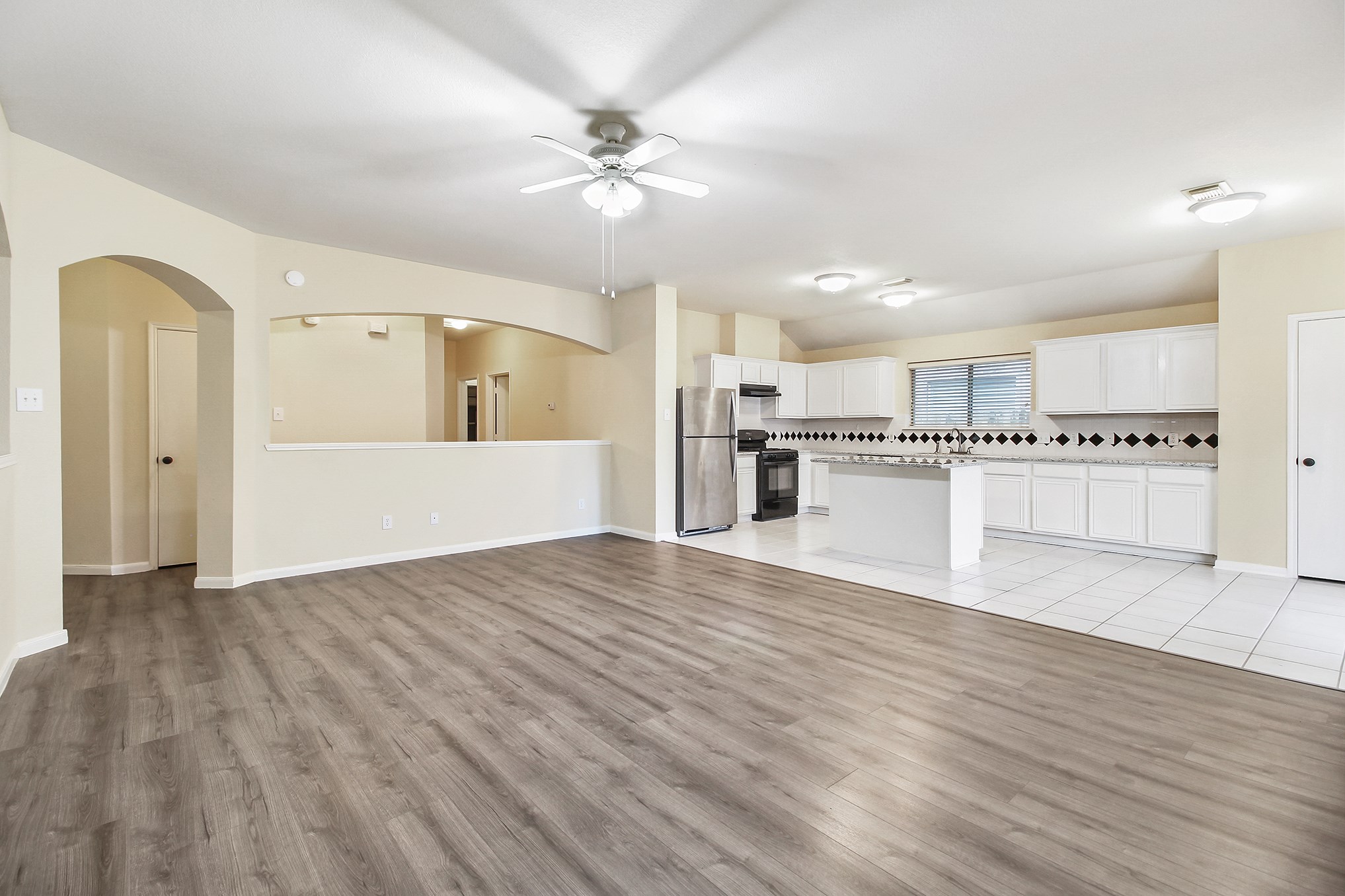 1814 Parkfair Court Katy, TX 77450 - Photo 21 of 36 Another view of this large family room opens to the kitchen area.
