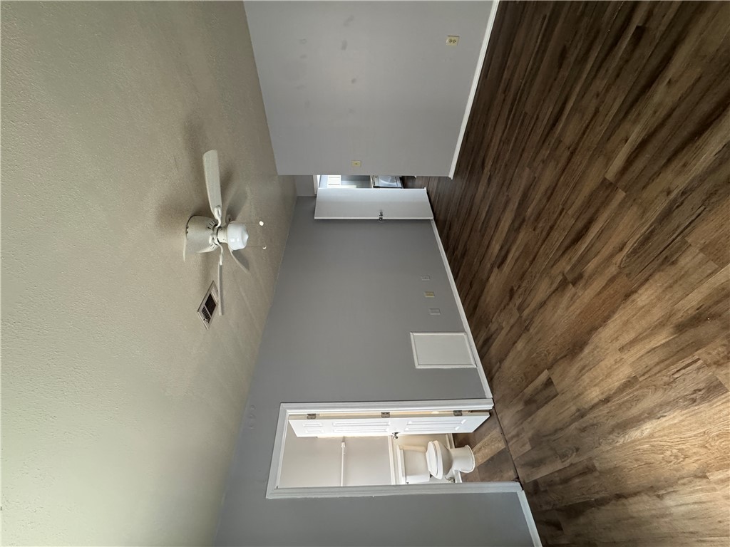 1008 Autumn Circle, Unit A College Station, TX 77840 - Photo 11 of 23 wooden floor in an empty room