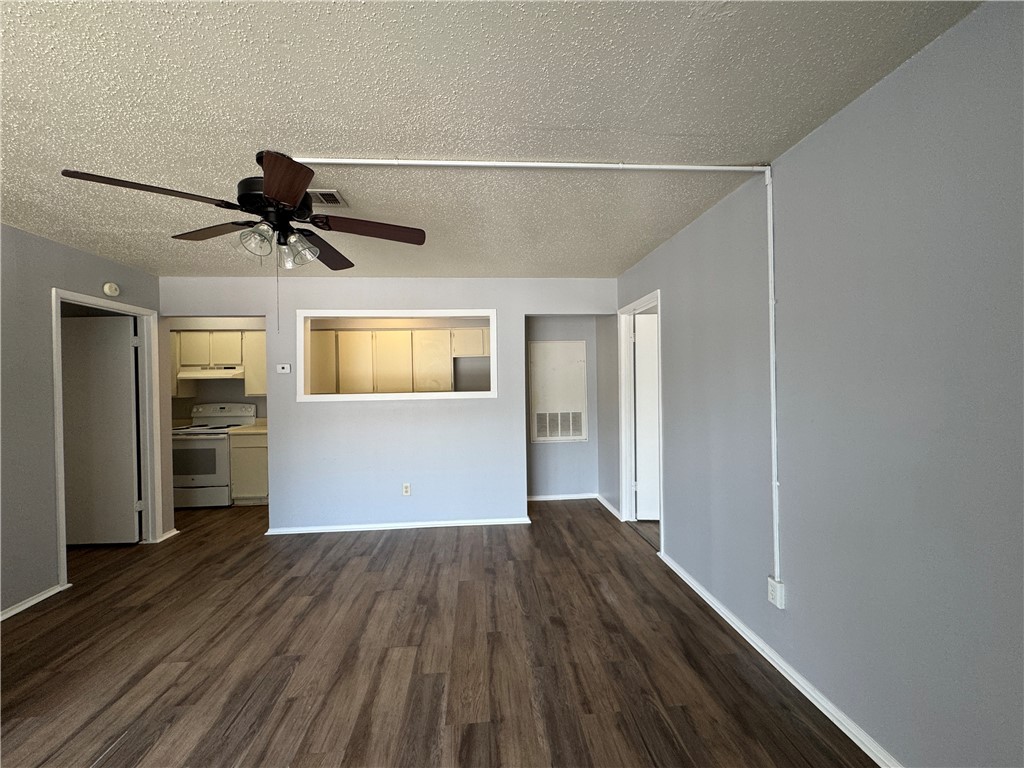 1008 Autumn Circle, Unit A College Station, TX 77840 - Photo 3 of 23 a view of empty room with wooden floor and window