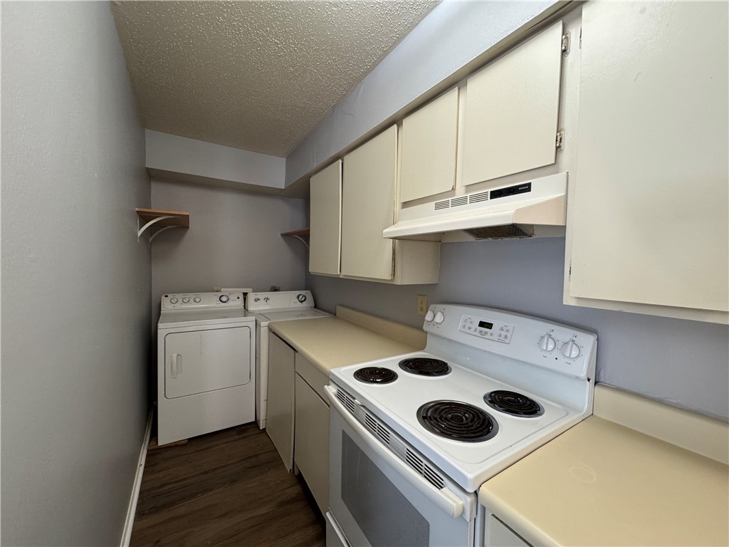 1008 Autumn Circle, Unit A College Station, TX 77840 - Photo 6 of 23 a utility room with dryer and washer