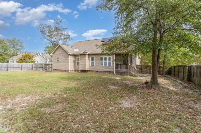 a picture of a park with a bench