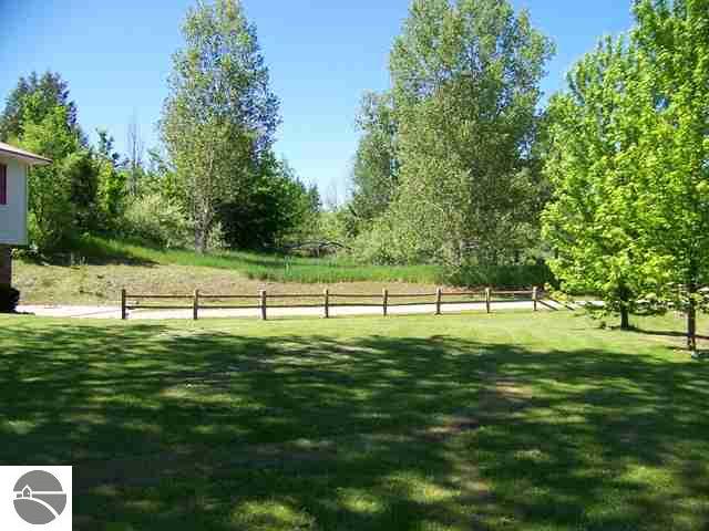 5033 Stricker Road Traverse City, MI 49684 - Photo 4 of 25 1734109-3.JPG