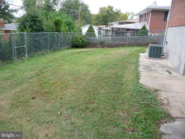 8309 Berkfield Road Baltimore, MD 21237 - Photo 14 of 15 a view of a backyard