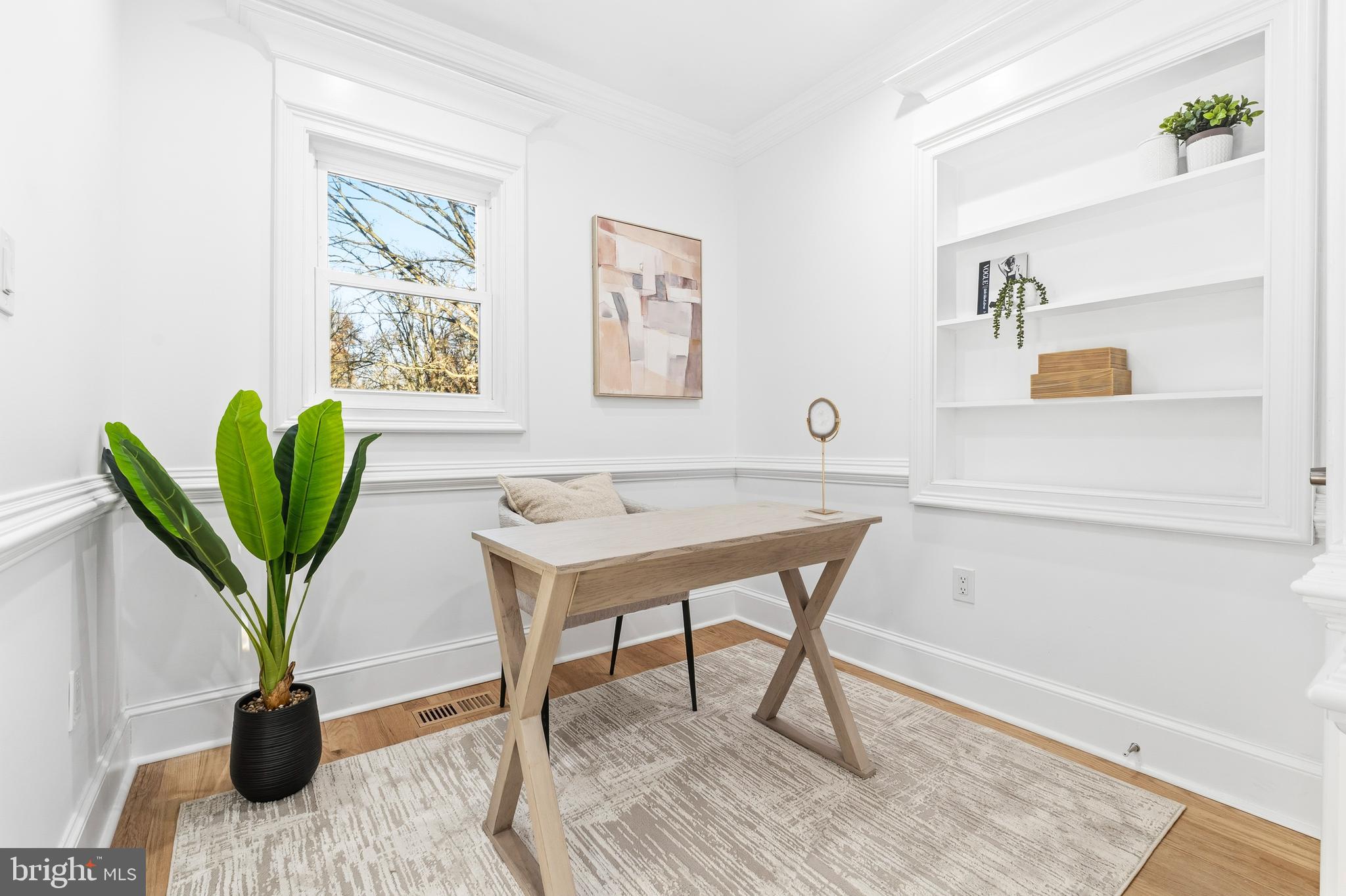 6218 Suitland Road Suitland, MD 20746 - Photo 14 of 52 a living room with furniture and a potted plant