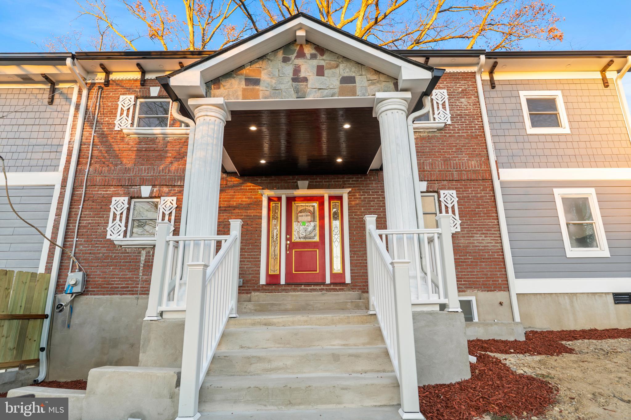 6218 Suitland Road Suitland, MD 20746 - Photo 45 of 52 a front view of a house with a porch