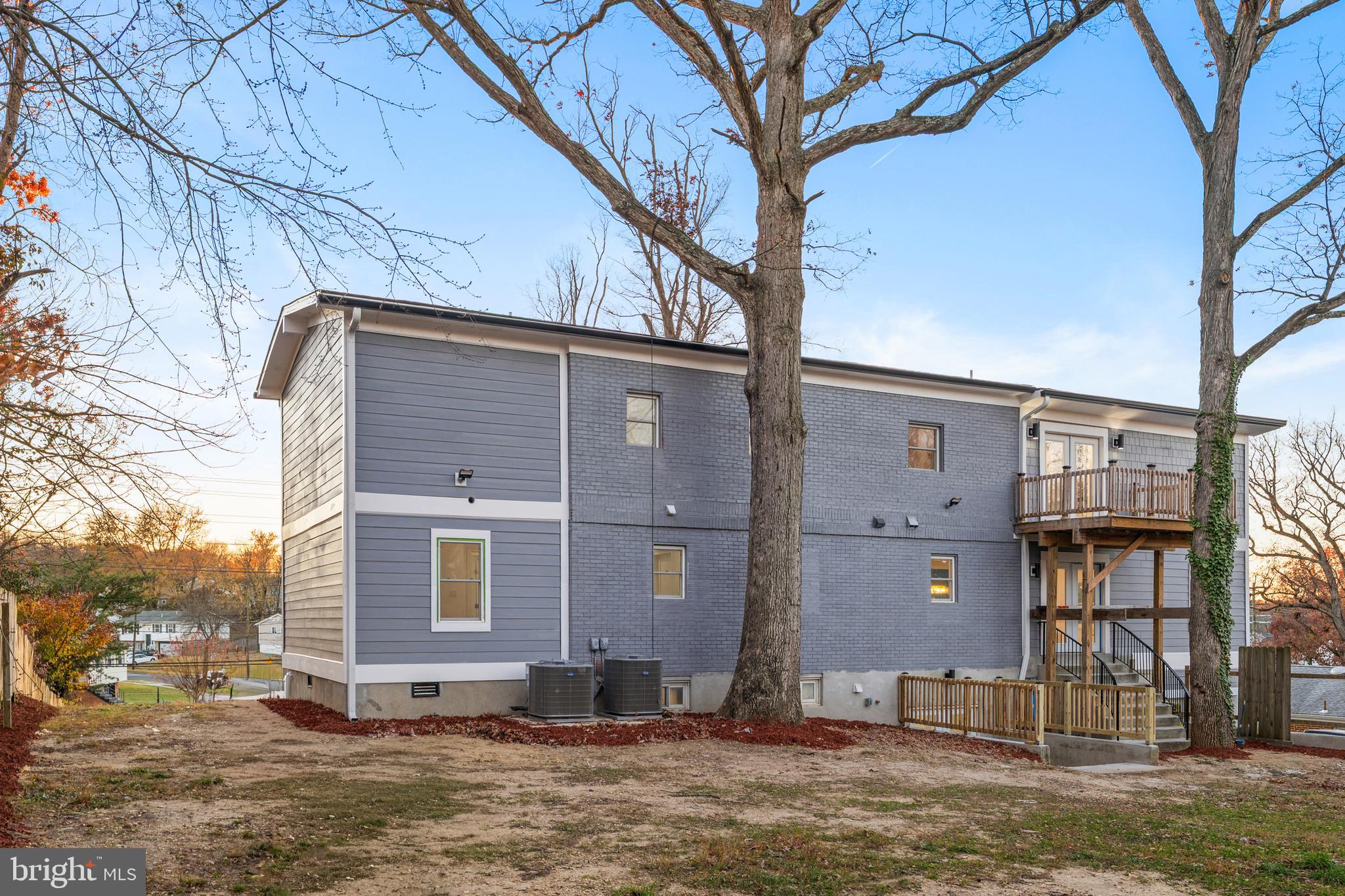 6218 Suitland Road Suitland, MD 20746 - Photo 47 of 52 a front view of a house with a yard