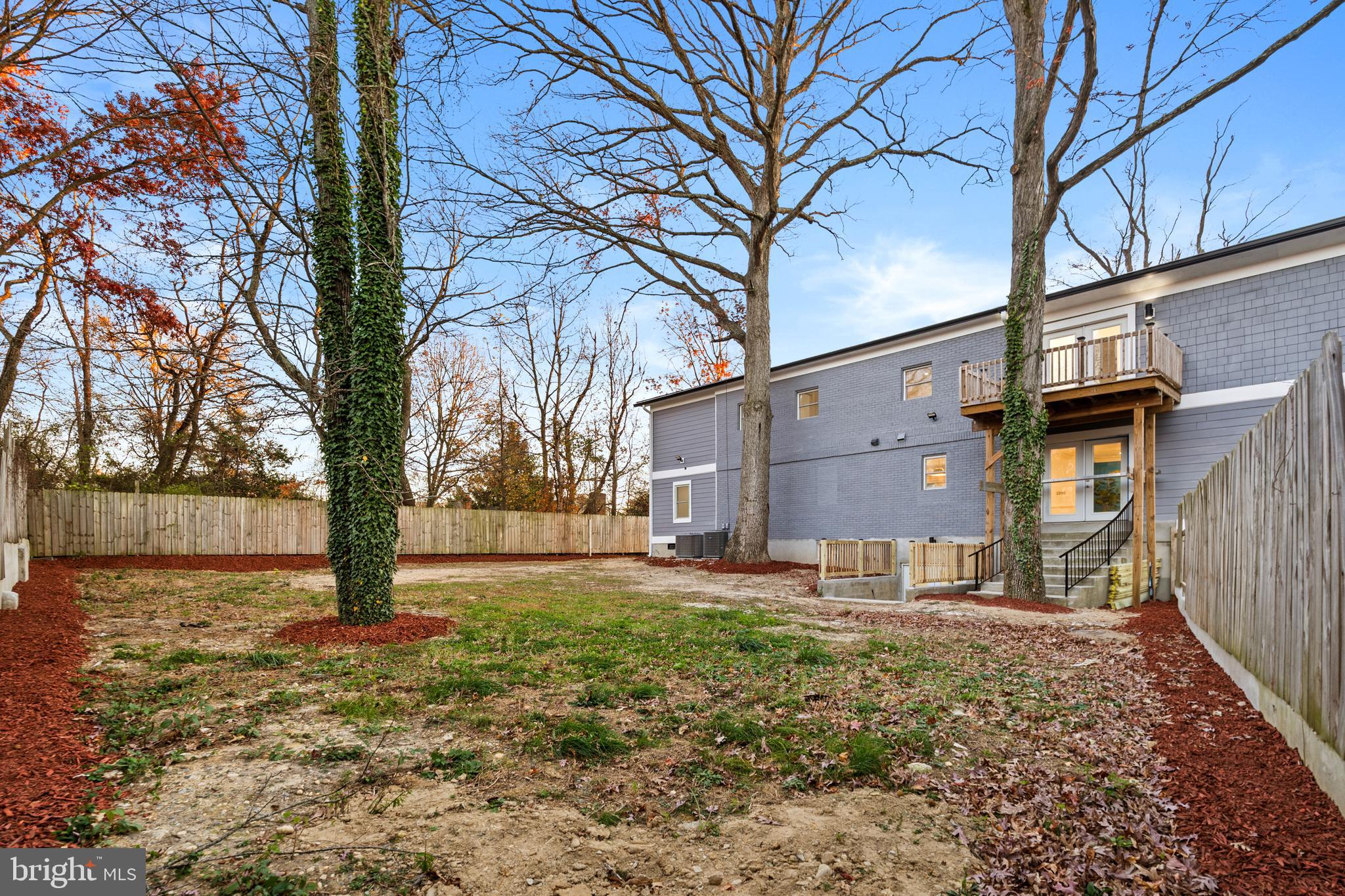 6218 Suitland Road Suitland, MD 20746 - Photo 48 of 52 a backyard of a house with lots of green space