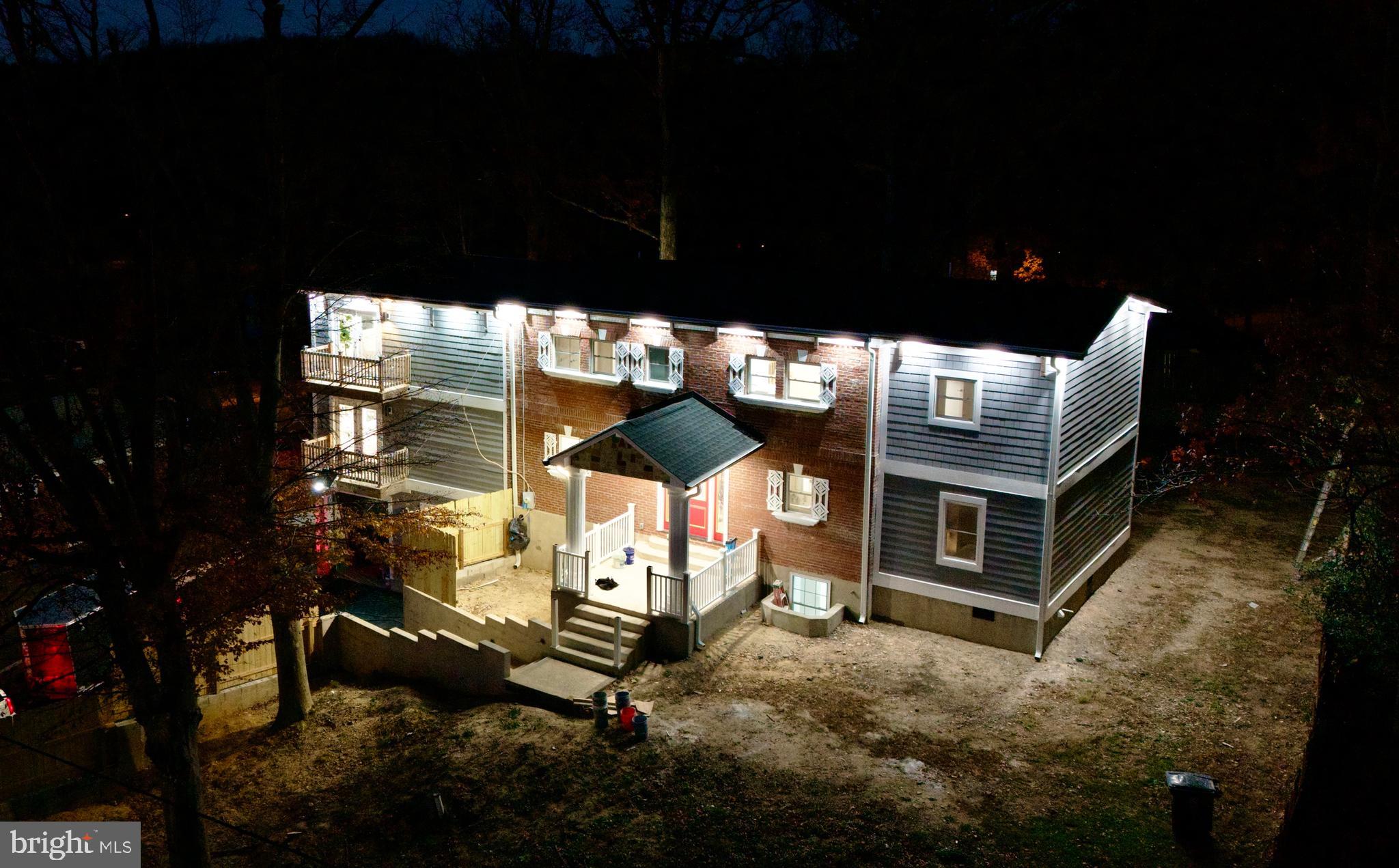 6218 Suitland Road Suitland, MD 20746 - Photo 50 of 52 a backyard of a house with table and chairs