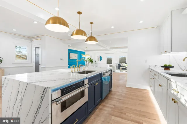 a kitchen with a stove and a sink
