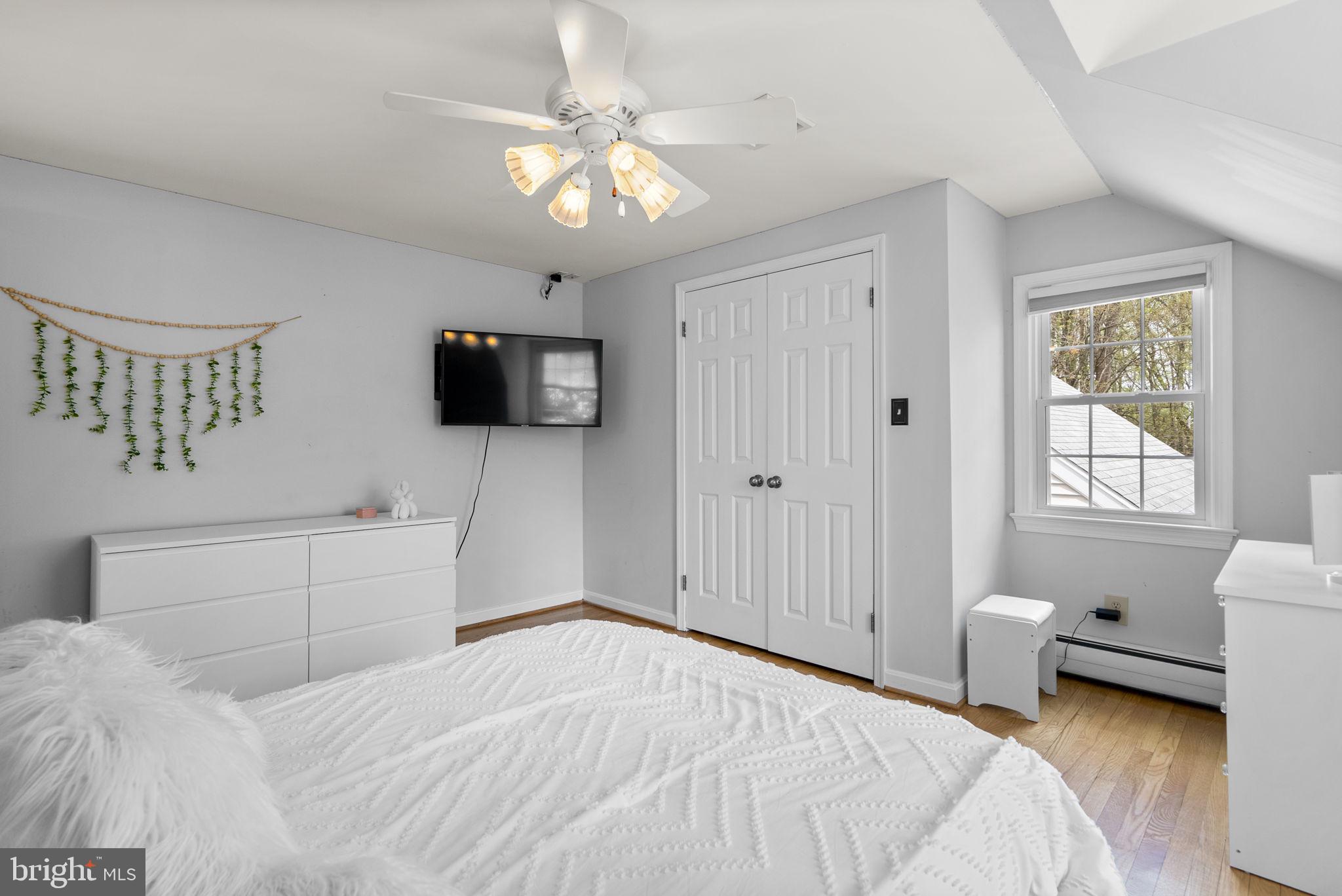 1210 Ashton Road Ashton, MD 20861 - Photo 40 of 71 a bedroom with a bed and a television
