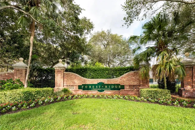 a view of an house with backyard space and garden