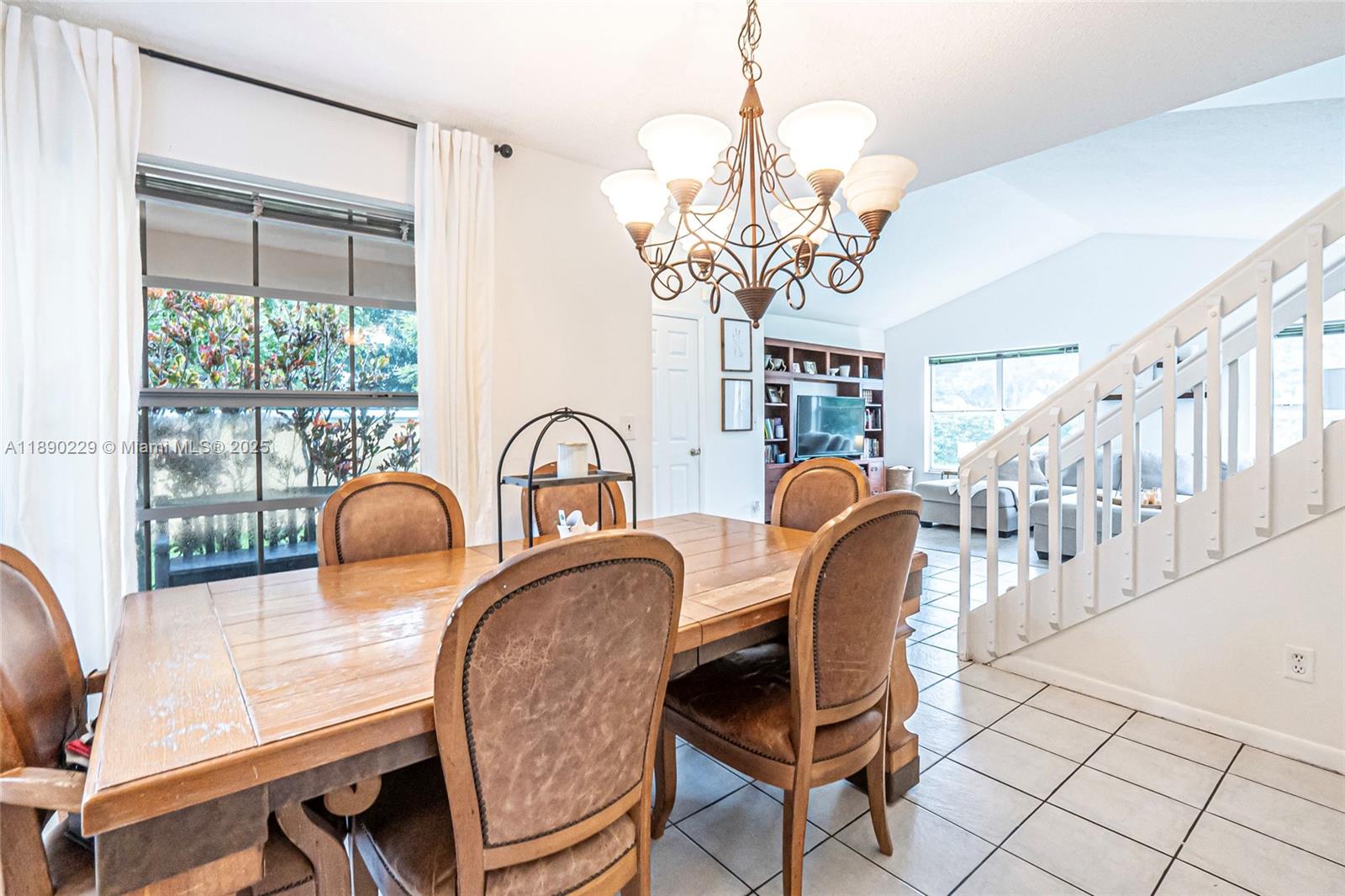 2913 Myrtle Oak Circle Davie, FL 33328 - Photo 21 of 35 a view of a dining room with furniture window and outside view