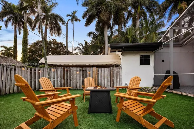 a view of a swimming pool with lounge chair