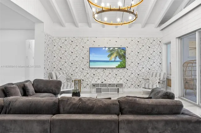 a white bath tub sitting next to a white toilet