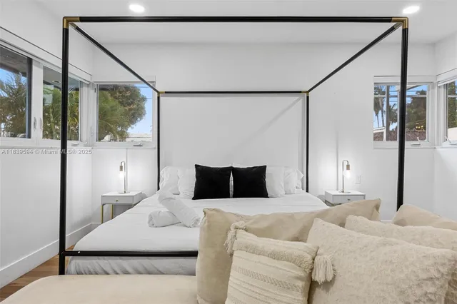 a bathroom with a toilet a sink and shower