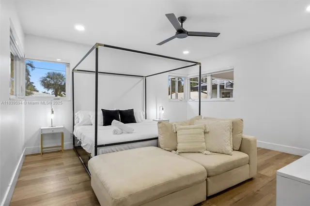 a bathroom with a toilet a sink and bathtub