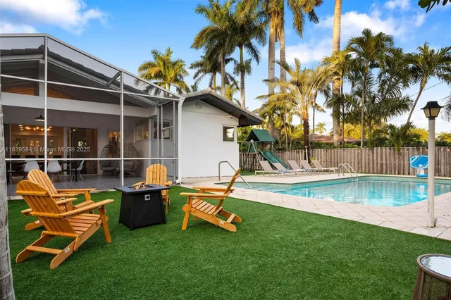 a view of a backyard with a patio