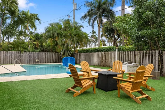 a living room with large windows