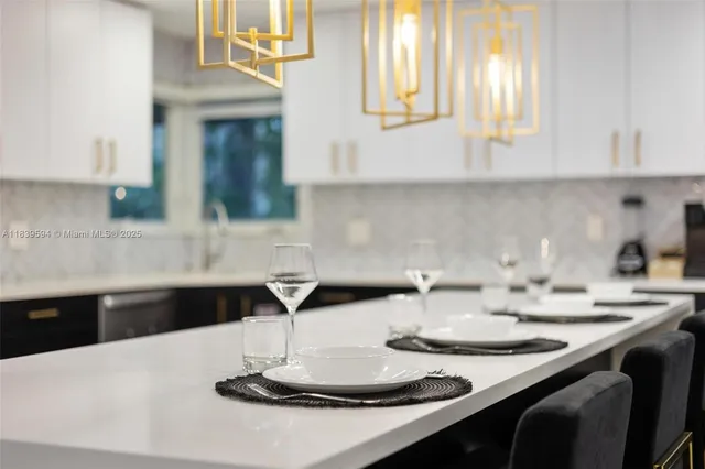 an aerial view of city and lake