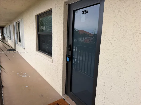 a view of parking with cars parked