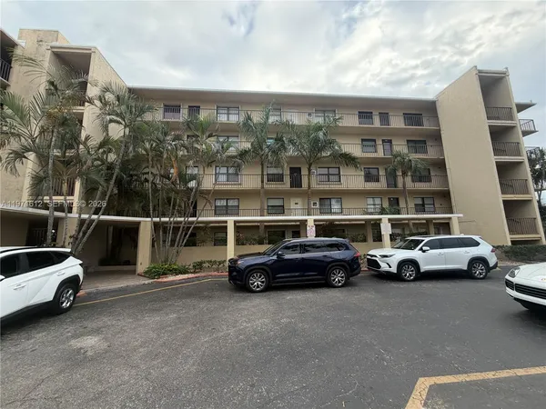 a view of a swimming pool with an outdoor seating