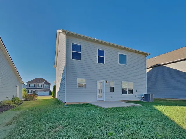 a house view with a backyard space