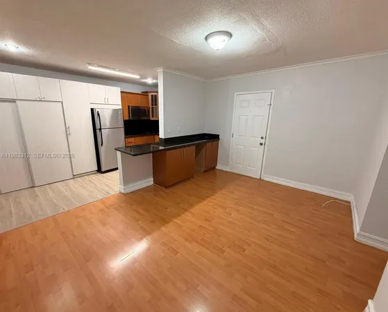 a room with furniture and a flat screen tv