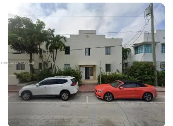 a cars parked in front of a house
