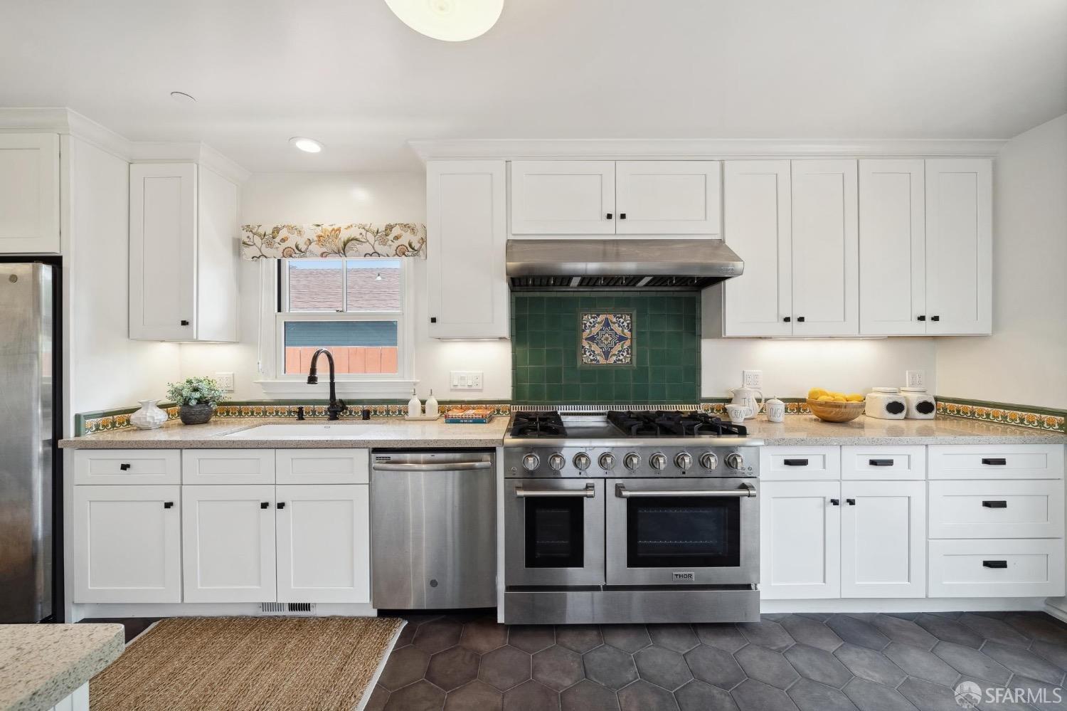 508 Talbot Avenue Albany, CA 94706 - Photo 19 of 66 a kitchen with stainless steel appliances granite countertop a stove and cabinets