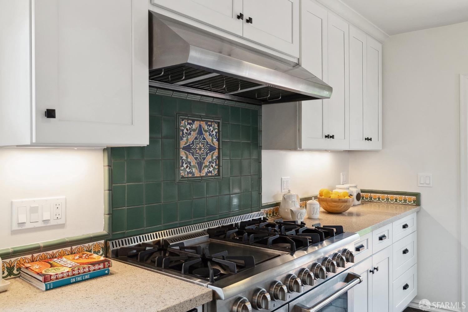 508 Talbot Avenue Albany, CA 94706 - Photo 20 of 66 a kitchen with a stove and a cabinets